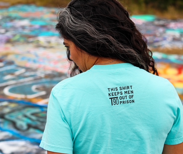 Turn90. This shirt keeps men out of prison. woman wearing blue shirt